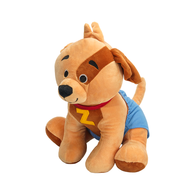 Bréagán plush madra donn ina suí - ainmhithe feirme